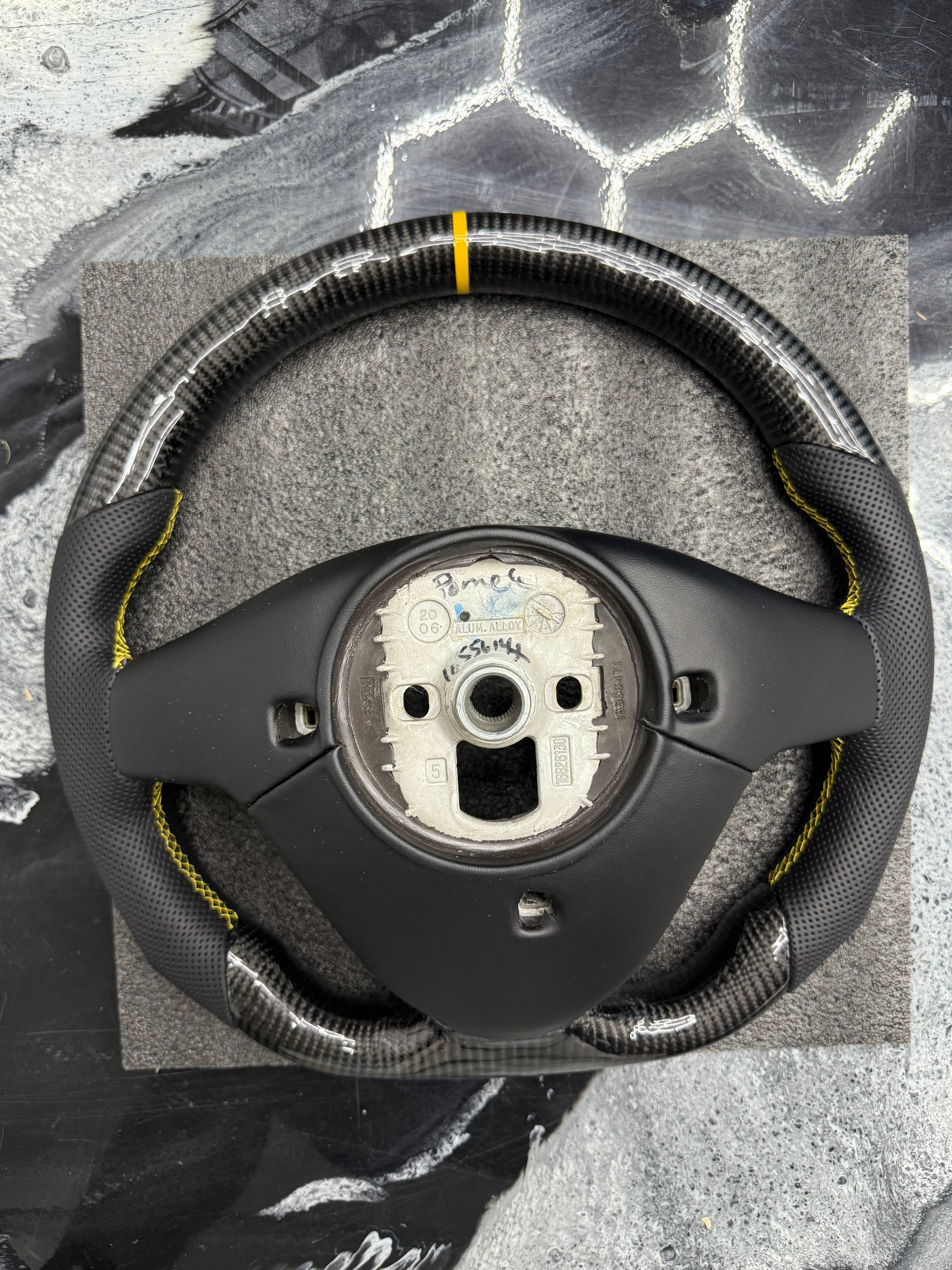 2003 - 2008 CTS, CTS-V V1 Custom Carbon Fiber Steering Wheel with Perforated Leather Hand Grips / Leather Rear Cover